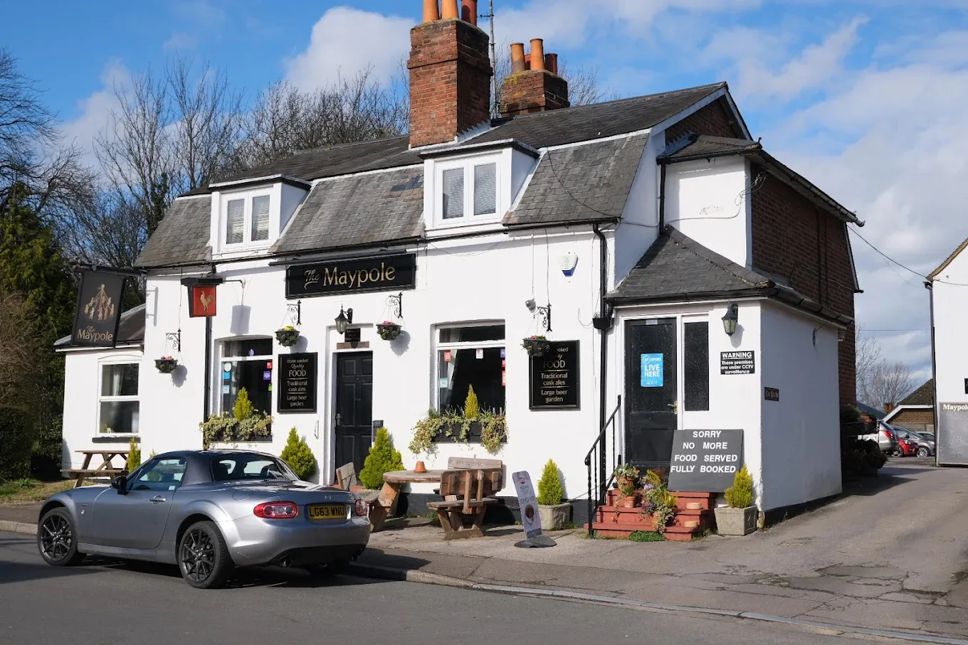 The Maypole Inn frontage on a sunny day